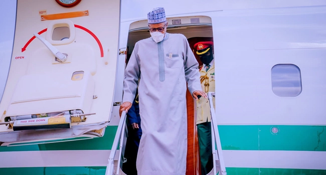Buhari Returns To Abuja After UN Summit In Abidjan